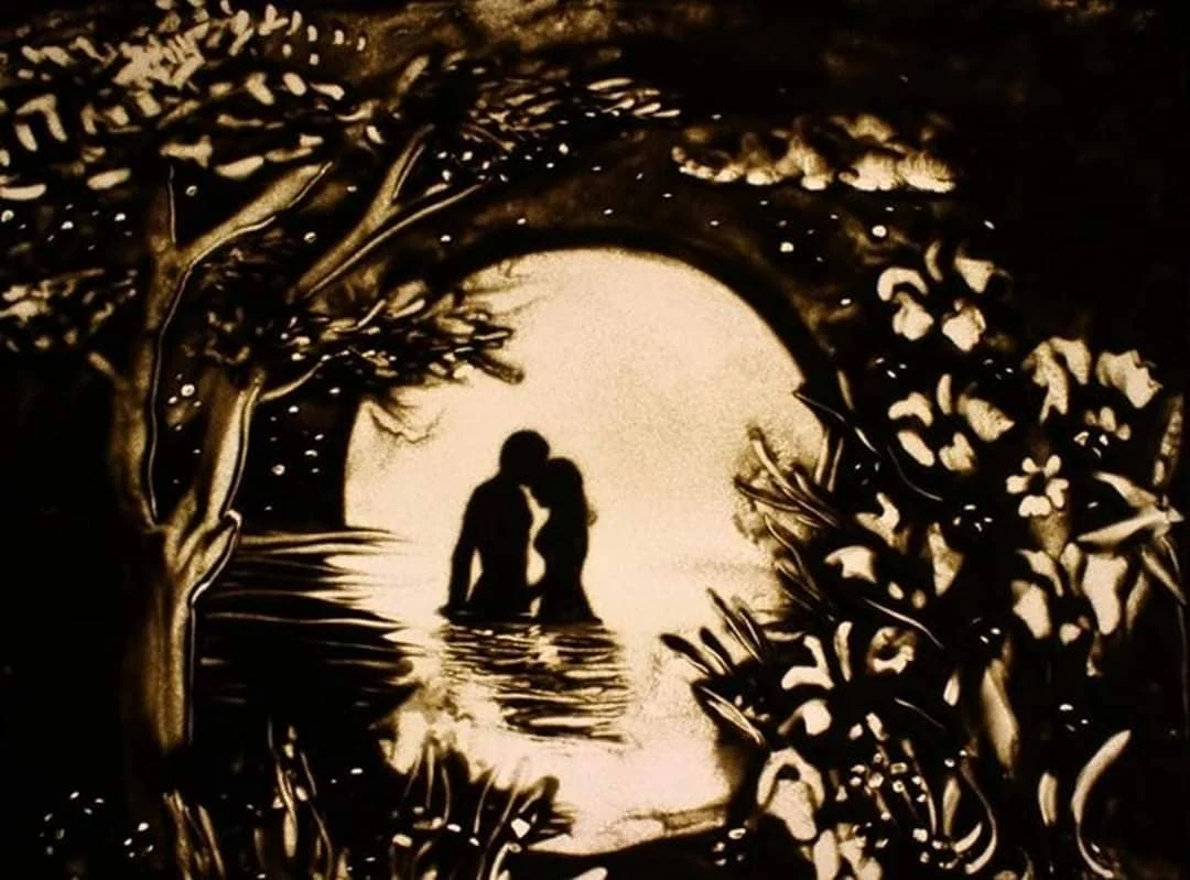 Love story created with sand