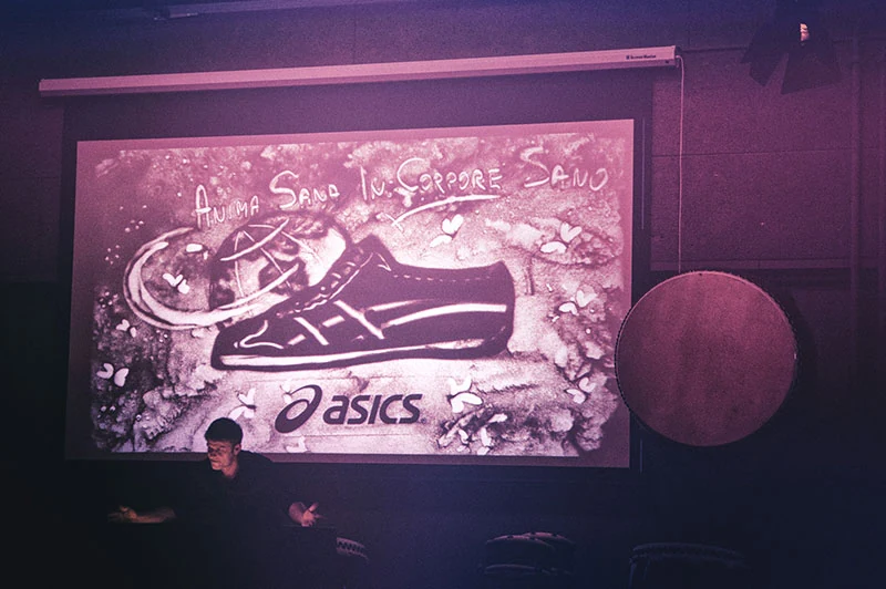 Branded live sand drawing event